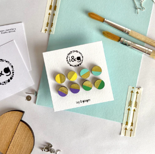 Four Gold Edged Wooden Studs